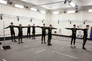Darsteller in MoCap-Anzügen.